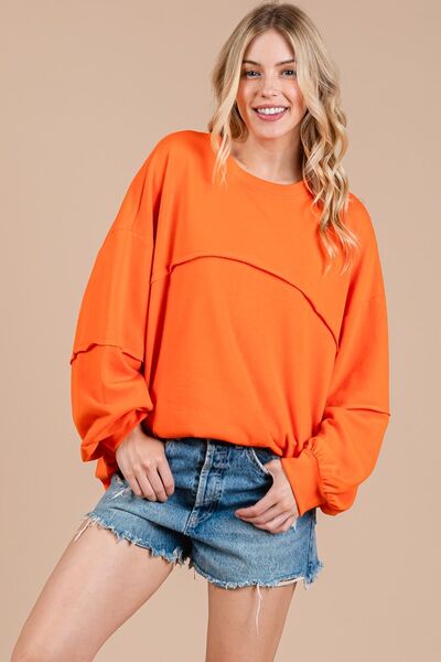 Ces Femme Exposed Seam Long Sleeve Sweatshirt, trendy casual top with notable seam detail.