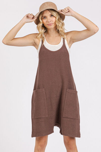 Mittoshop Scoop Neck Spaghetti Strap Overalls with Pockets in brown, worn by a model with a hat.