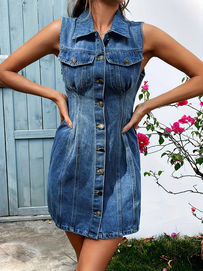 Sleeveless denim dress with button-up front and pockets, made from cotton and polyester blend.