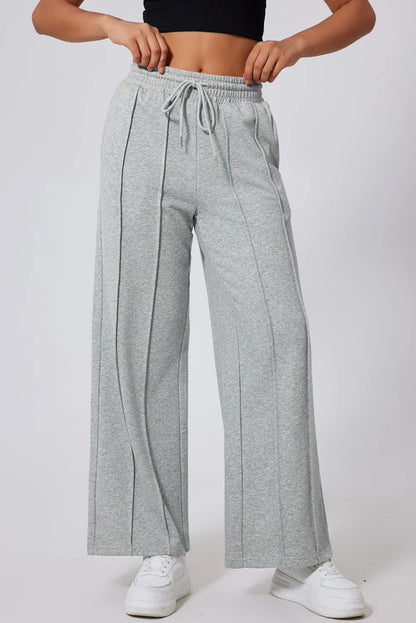 Drawstring wide leg active pants in gray with elastic waistband, no stretch fabric.