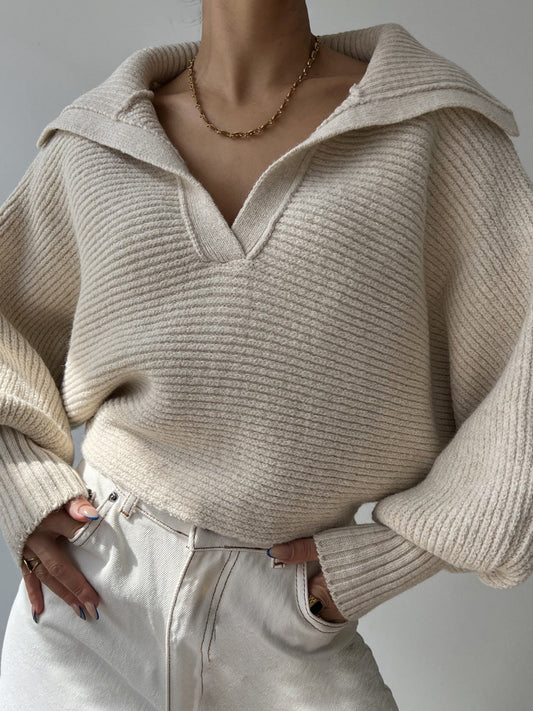 Johnny Collar Long Sleeve Sweater in ribbed knit with moderate stretch.