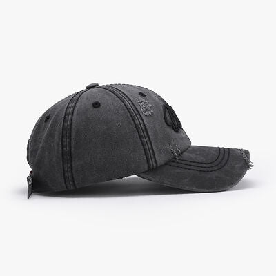 Embroidered letter cotton baseball cap with a black finish.