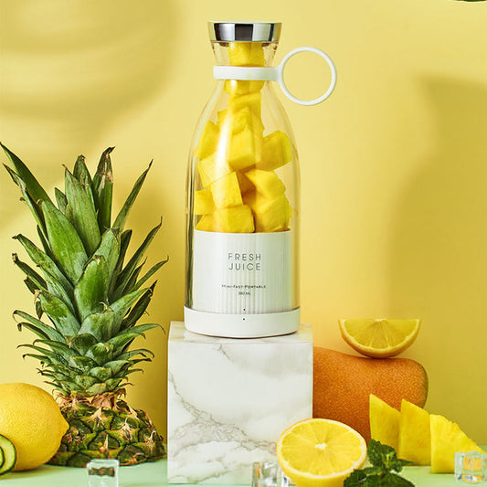 Portable Quick Juicing Machine Cup with fruits, ergonomic design.