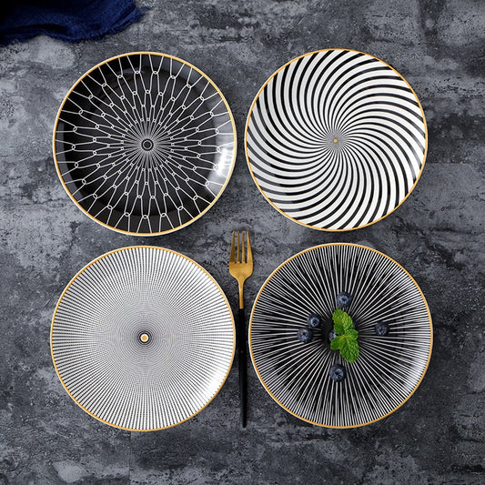 Geometric pattern ceramic plates with intricate designs on a dark background.