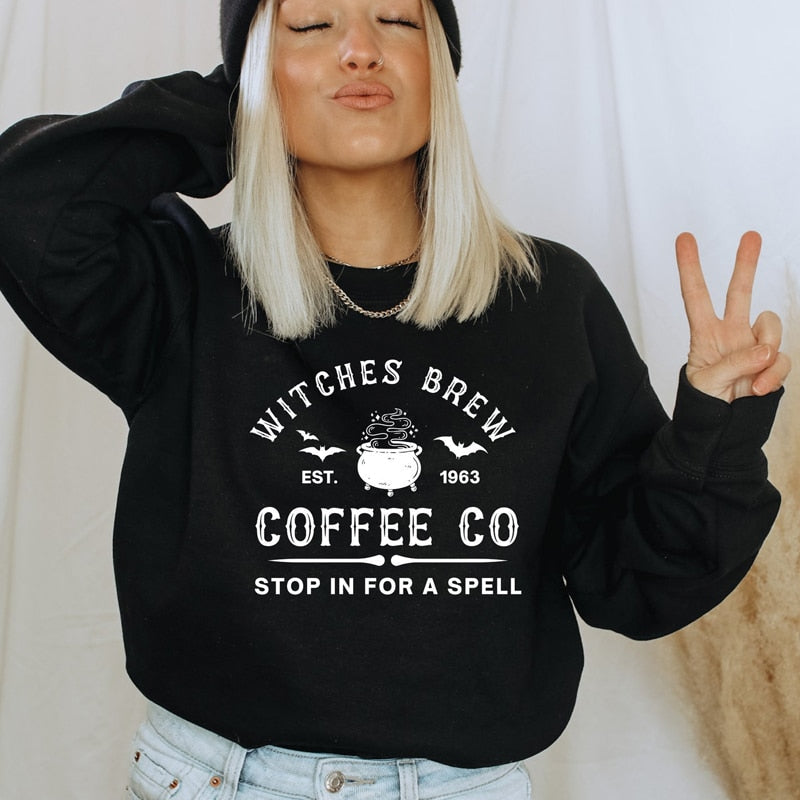 Witches Brew Coffee Co Sweatshirt for women with printed design, perfect for fall casual wear.