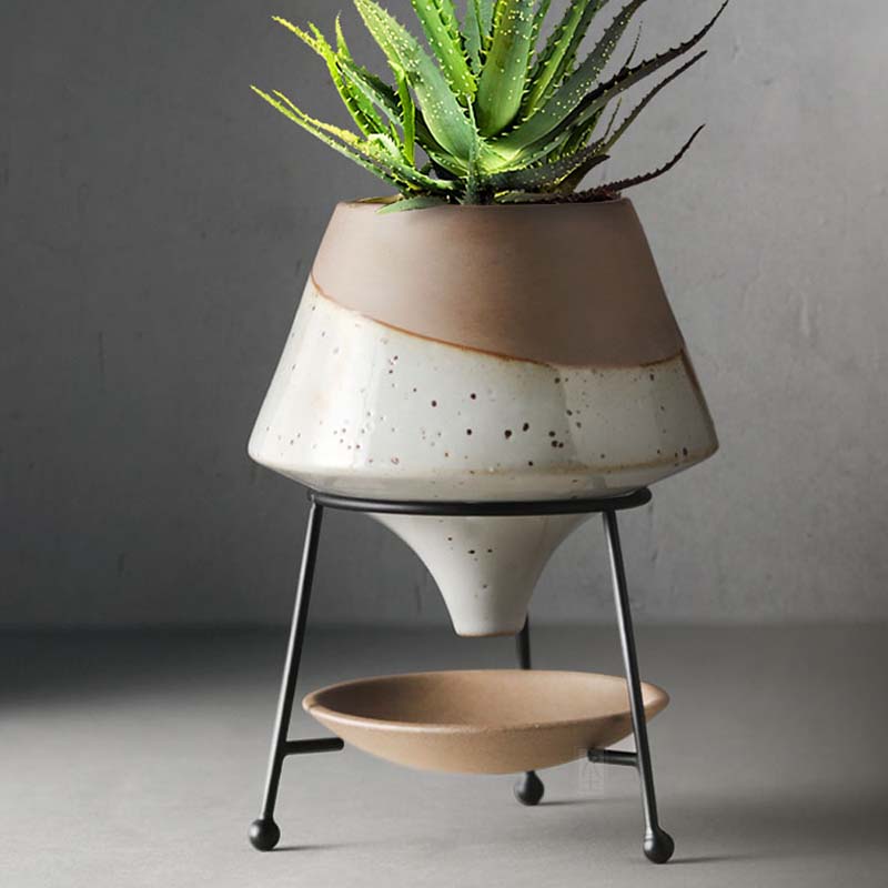 Creative Ceramic Flowerpot with modern Nordic ins flower iron frame and stability feet, showcasing a stylish home for plants.