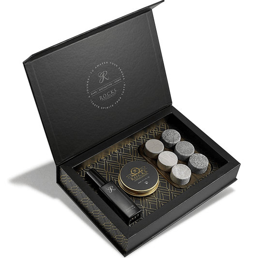 The Gentleman's Essentials - Whiskey Stones & Grooming Kit Gift Set in elegant black packaging.