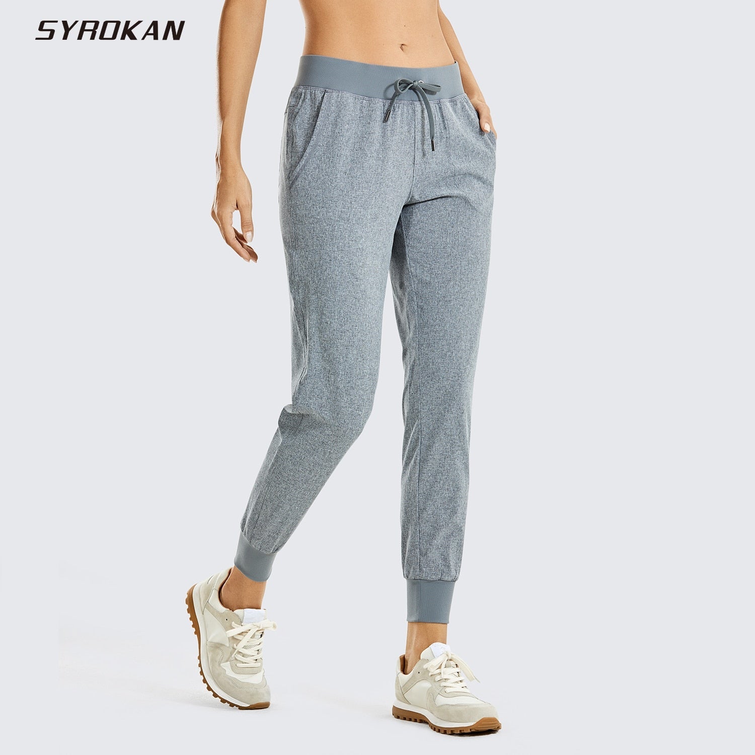 Women's lightweight drawstring jogger pant in slate blue with pockets.