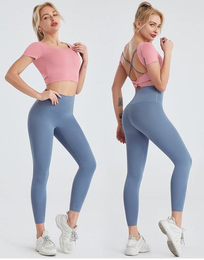 Women's yoga tight trousers in light blue, quick-drying and sweat-resistant, shown with pink tops.